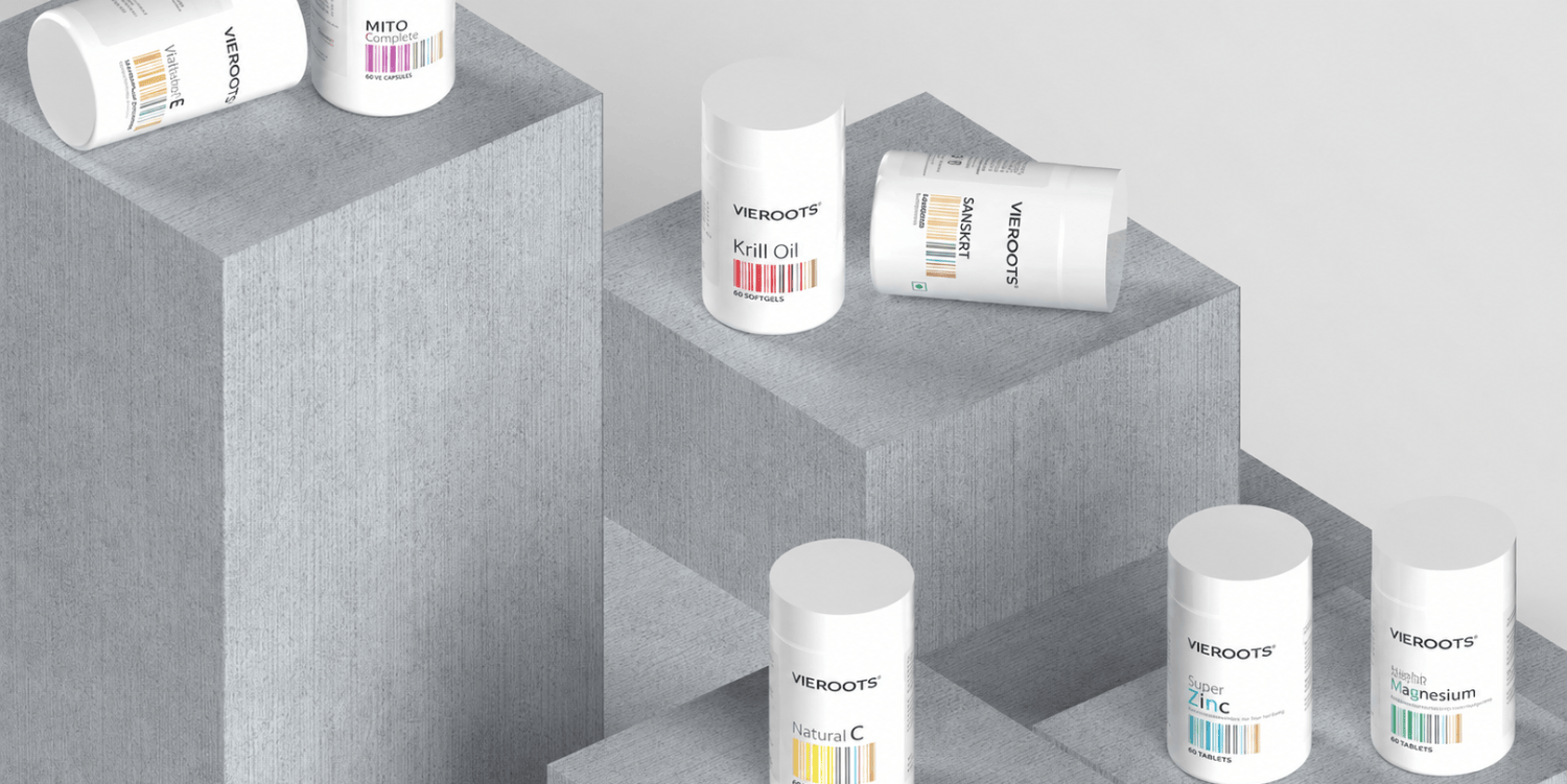 Vieroots Precision Nutrition supplements displayed on grey blocks, including Krill Oil, Super Magnesium, Super Zinc, Natural C, Natural E and MITO Complex